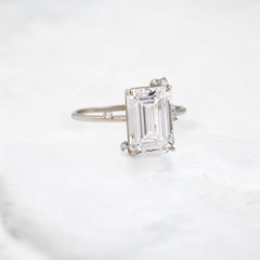 white-flameleaf-petals-emerald-moissanite-engagement-ring-4-25-ct-white-gold-gemfora-2